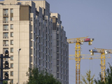 Một công trình xây dựng tại thủ đô Bắc Kinh (Ảnh: EPA)