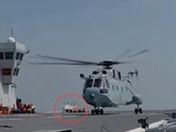 Hình ảnh chiếc trực thăng không người lái bí ẩn trên tàu đổ bộ tấn công Type 075 Hải Nam (Ảnh: 163).