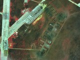 Ảnh chụp từ vệ tinh cho thấy sân bay Saki bị thiệt hại nặng nề sau vụ nổ hôm 9/8 (Ảnh: MAXAR).