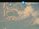 Quân đội Nga pháo kích vào chiến tuyến phòng ngự quân đội Ukraine. Ảnh video Rusvesna.