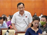 Thiếu tướng Đinh Thanh Nhàn - phó giám đốc Công an TP.HCM - trao đổi tại phiên thảo luận - Ảnh: Tuổi trẻ
