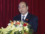 Chủ tịch nước Nguyễn Xuân Phúc, Trưởng Ban Chỉ đạo Cải cách tư pháp Trung ương phát biểu tại hội thảo khoa học.