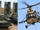 Hệ thống phòng không S-400 và trực thăng Mi-8 (Ảnh: Military Watch)