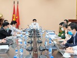 Thứ trưởng Bộ Y tế Đỗ Xuân Tuyên chủ trì cuộc họp kiểm điểm tiến độ tiêm vaccine COVID-19 (Ảnh - Trần Minh)
