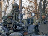 Lực lượng dân quân Luhansk tiến công (Ảnh: Japantimes)