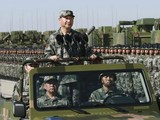 Chủ tịch Trung Quốc Tập Cận Bình yêu cầu tập trung hơn vào phát triển quân đội (Ảnh: AP)