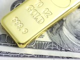 Giá vàng sụt giảm trước một đồng USD quá mạnh trong năm nay (Ảnh: TheBalance)