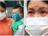Người mẹ vui mừng bật khóc khi con gái hơn 1 tuổi được chữa khỏi COVID-19 (Ảnh: Nguyễn Trăm ghép)