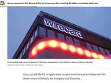 Hãng tin CNBC đưa tin Wirecard phá sản, với ảnh chụp trụ sở Wirecard tại Đức