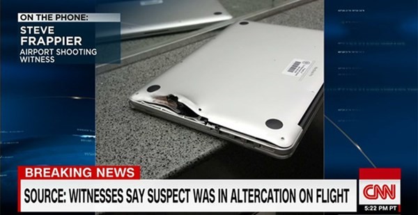 Chiếc MacBook Pro bị hư hỏng nặng sau phát súng.