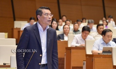 Thống đốc Lê Minh Hưng trả lời chất vấn tại nghị trường Quốc hội (Ảnh minh họa - Nguồn: quochoi.vn)