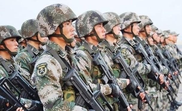 Luật Quốc phòng sửa đổi của Trung Quốc đưa thêm "lợi ích phát triển" bị đe dọa là thêm cớ để phát động chiến tranh (Ảnh: Dongfang).
