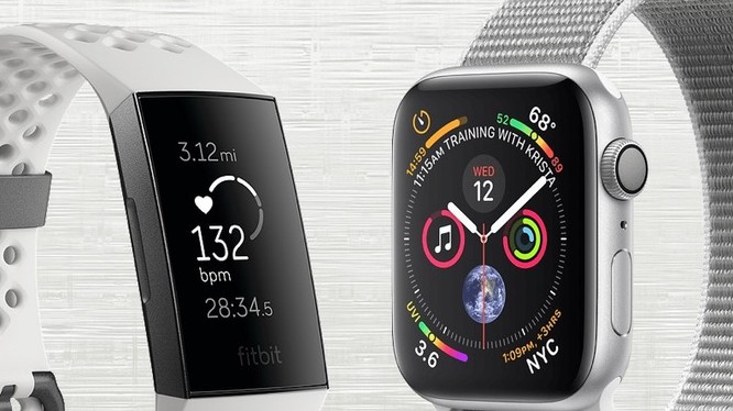 Fitbit Charge 3 và Apple Watch Series 4. Ảnh: Gadgetsandwearables