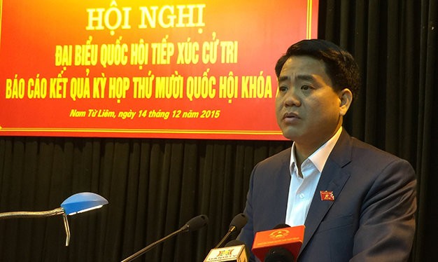 Ông Nguyễn Đức Chung, chủ tịch UBND thành phố Hà Nội tại buổi tiếp xúc cử tri sáng 14-12 - Ảnh: Xuân Long