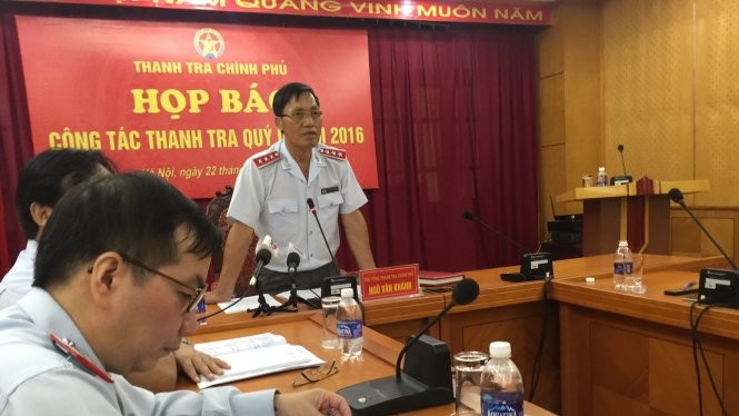 Ông Ngô Văn Khánh trả lời báo chí tại buổi họp báo