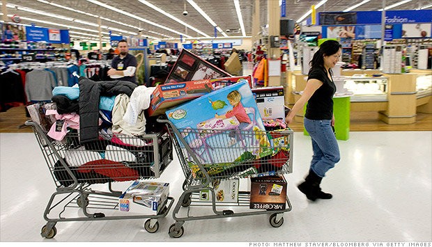 Wal-Mart có hơn 10.400 siêu thị ở 27 quốc gia (năm 2011) với hơn 2,2 triệu nhân viên, phục vụ hơn 200 triệu lượt khách mỗi tuần - Ảnh: Getty Images