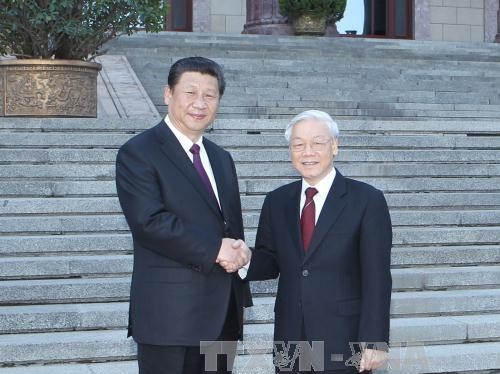 Tổng Bí thư, Chủ tịch nước Trung Quốc Tập Cận Bình đón Tổng Bí thư Nguyễn Phú Trọng. Ảnh: Trí Dũng - TTXVN