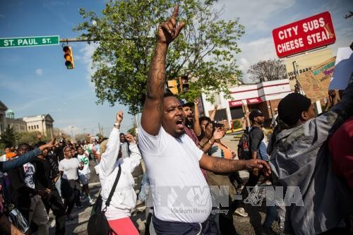Quang cảnh cuộc tuần hành ở Baltimore ngày 30/4. Ảnh: AFP/TTXVN