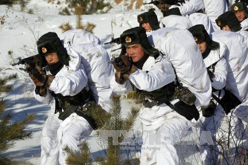 Binh sĩ quân đội Trung Quốc tham gia tập trận ở tỉnh Hắc Long Giang. AFP/TTXVN