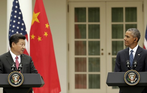 Tổng thống Mỹ Barack Obama (phải) và Chủ tịch Trung Quốc Tập Cận Bình trong cuộc họp báo tại Nhà Trắng hôm 25/9. Ảnh: Reuters