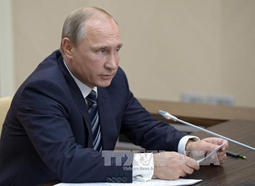 Tổng thống Nga Vladimir Putin ngày 30/9 kêu gọi Tổng thống Syria nên sẵn sàng thỏa hiệp với lực lượng đối lập nhằm chấm dứt cuộc khủng hoảng chính trị kéo dài tại đây. Ảnh: AFP/TTXVN