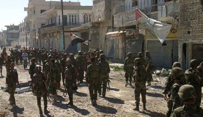 Binh sĩ Syria sau một trận chiến ác liệt trên đường phố Aleppo