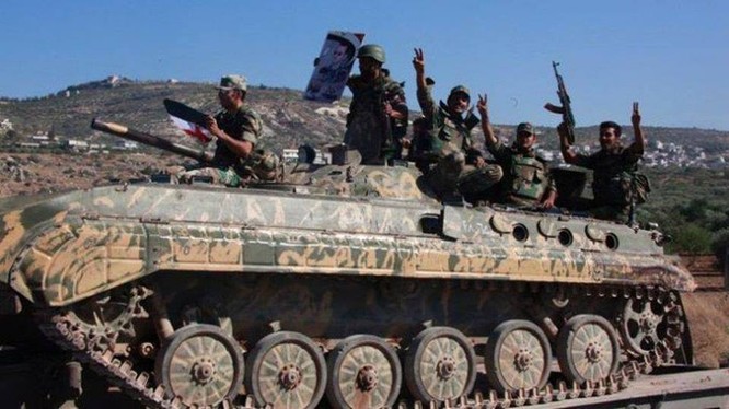 Các binh sĩ thuộc lực lượng vũ trang địa phương NDF ở Latakia