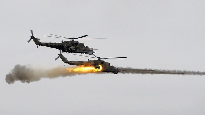 Trực thăng chiến đấu Nga trên chiến trường Syria - ảnh minh họa Masdar News