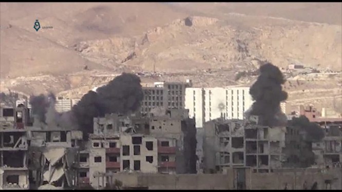 Không quân Syria tập kích hỏa lực dữ dội khu vực Đông Ghouta - ảnh minh họa video Masdar News