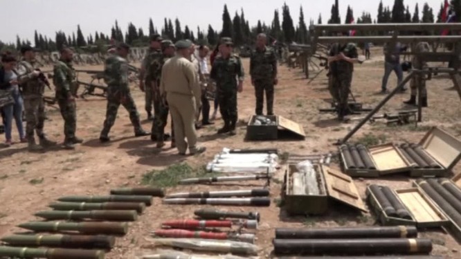 Vũ khí trang bị lực lượng Hồi giáo cực đoan giao nộp ở vùng Rastan- phía băc tỉnh Homs. ảnh minh họa video Ruptly