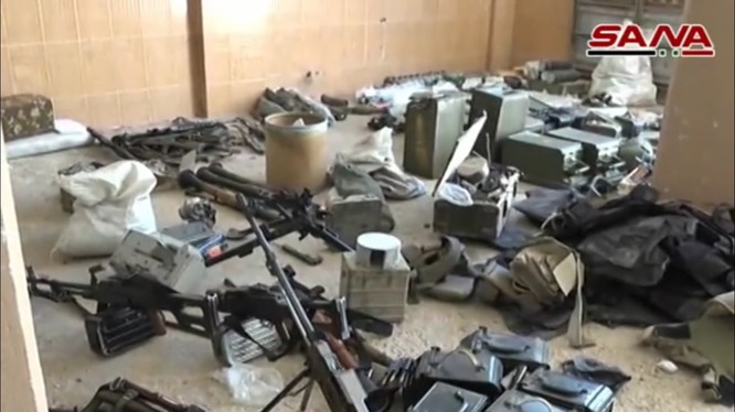 Các tay súng nổi dậy FSA giao nộp vũ khí ở Rastan. Ảnh minh họa South Front
