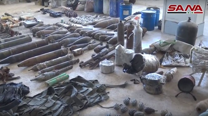 Quân đội Syria thu giữ vũ khí của lực lượng Hồi giáo cực đoan ở Đông Ghouta. Ảnh minh họa video SANA