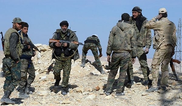 Lực lượng vũ trang địa phương NDF trên chiến trường Lattakia. Syria. Ảnh minh họa: Masdar News.