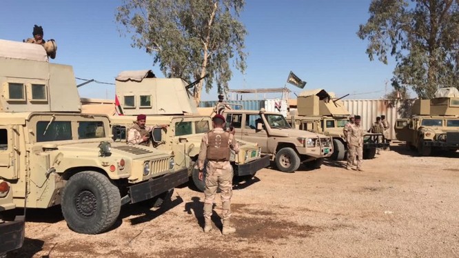Quân đội Iraq và lực lượng quân tình nguyện PMU triển khai dọc biên giới với Syria. Ảnh minh họa: Ruptly.