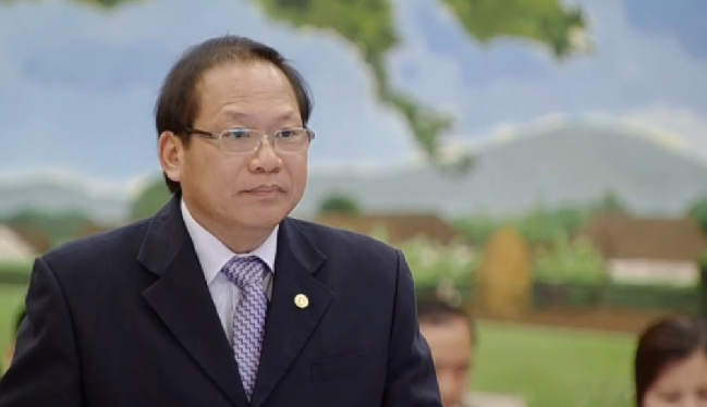Bộ trưởng Bộ Thông tin và Truyền thông Trương Minh Tuấn tại phiên trả lời chất vấn chiều nay (ảnh chụp màn hình).
