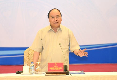 Thủ tướng Nguyễn Xuân Phúc phát biểu tại tọa đàm - Ảnh: VGP/Quang Hiếu