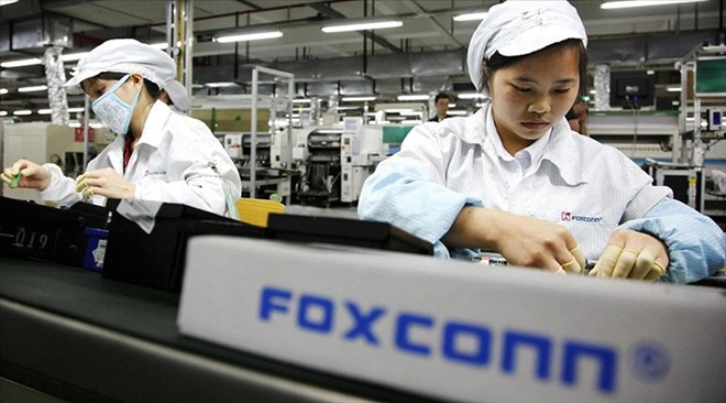 Công nhân Foxconn đang bị giảm giờ làm, hạ lương và cắt phúc lợi ẢNH: AFP