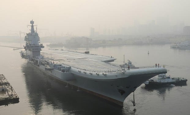 Tàu sân bay tự đóng của Trung Quốc đang được thử nghiệm (Ảnh: AFP)