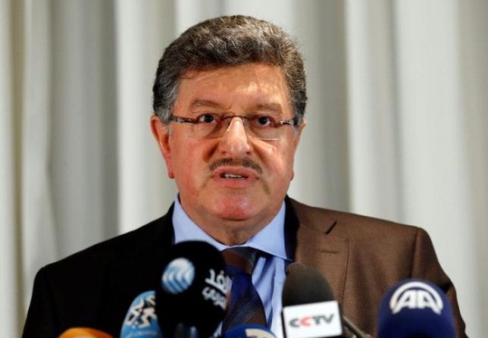 Phát ngôn viên phe đối lập Salim al-Muslat phát biêu tại cuộc hòa đàm ở Geneva - Thụy Sĩ ngày 31-1. Ảnh: Reuters