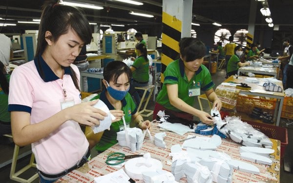 Trên thế giới chỉ có Việt Nam và Trung Quốc là đang áp dụng hình thức doanh nghiệp phải đóng tiền để nuôi hệ thống công đoàn, không phục vụ lợi ích gì cho doanh nghiệp. Ảnh: UYÊN VIỄN