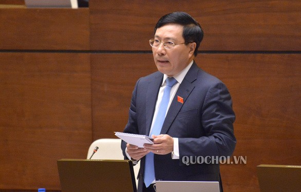 Phó thủ tướng - Bộ trưởng Bộ Ngoại giao Phạm Bình Minh tham gia giải trình trong một phiên họp của Quốc hội - Ảnh: Quochoi.vn
