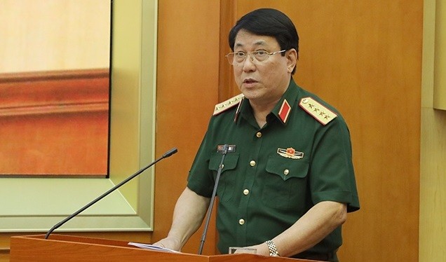 Đại tướng Lương Cường trình bày báo cáo tại hội nghị.