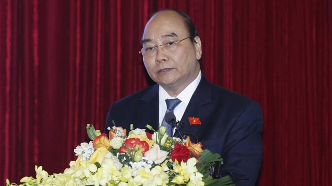 Chủ tịch nước Nguyễn Xuân Phúc, Trưởng Ban Chỉ đạo Cải cách tư pháp Trung ương phát biểu tại hội thảo khoa học.