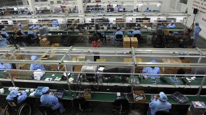 Trung Quốc là một trong những thị trường có chi phí lao động phổ thông rẻ nhất - Ảnh: AFP
