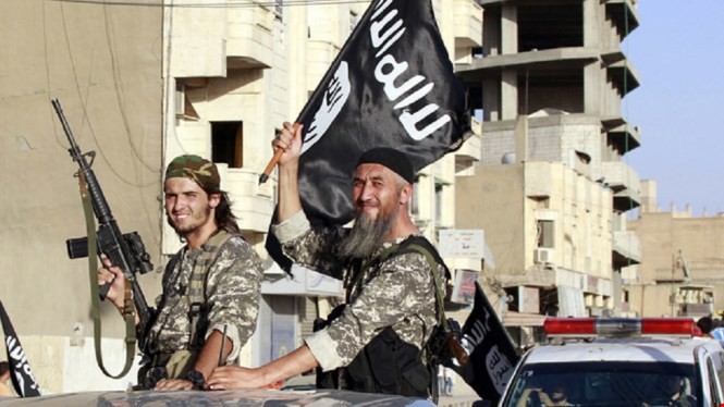 Phiến quân IS - Ảnh: Reuters