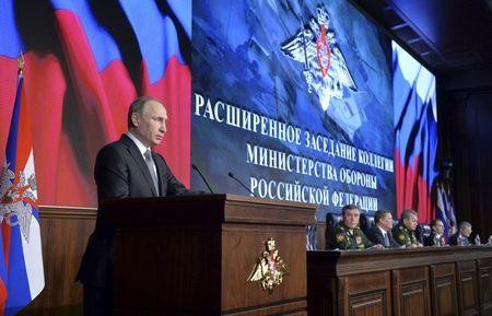 Tổng thống Nga Putin phát biểu trong cuộc họp thường niên tại Bộ Quốc phòng Nga tại Moscow hôm 11-12. Ảnh: Reuters