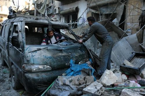 Cảnh đổ nát sau các cuộc giao tranh giữa quân đội chính phủ và phiến quân tại thành phố Aleppo, miền nam Syria ngày 16/1. Ảnh: AFP/TTXVN
