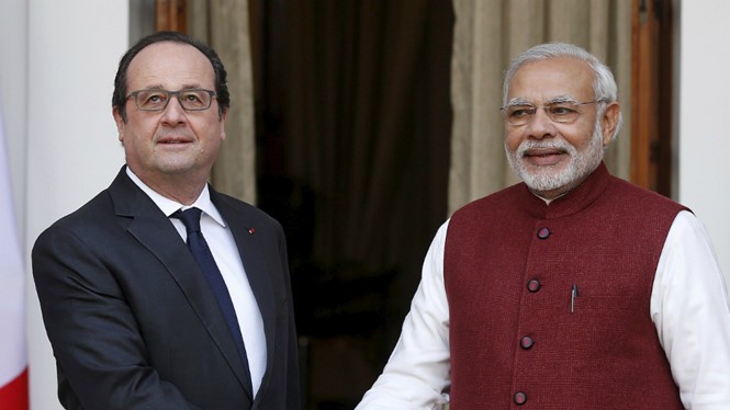 Hợp đồng bán máy bay chiến đấu Rafale là trọng tâm trong chuyến thăm Ấn Độ của Tổng thống Pháp Francois Hollande (trái) - Ảnh: Reuters