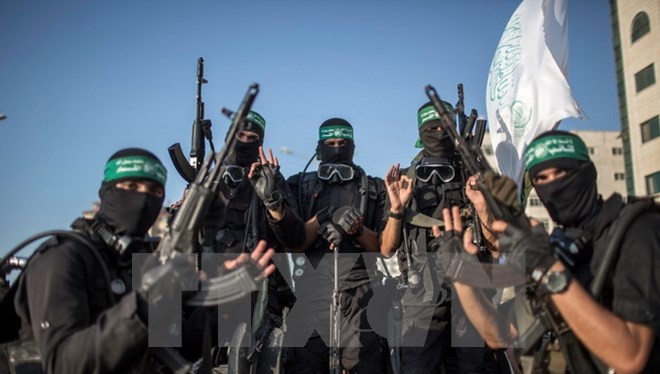 Các thành viên Lữ đoàn Ezzedine al-Qassam, cánh vũ trang của phong trào Hamas tại thành phố Gaza. (Nguồn: THX/TTXVN)