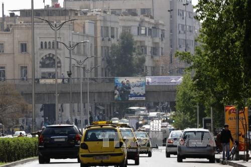 Cảnh đông đúc trên một đường phố ở thủ đô Damascus ngày 27/2 sau khi lệnh ngừng bắn có hiệu lực. Ảnh: AFP/TTXVN
